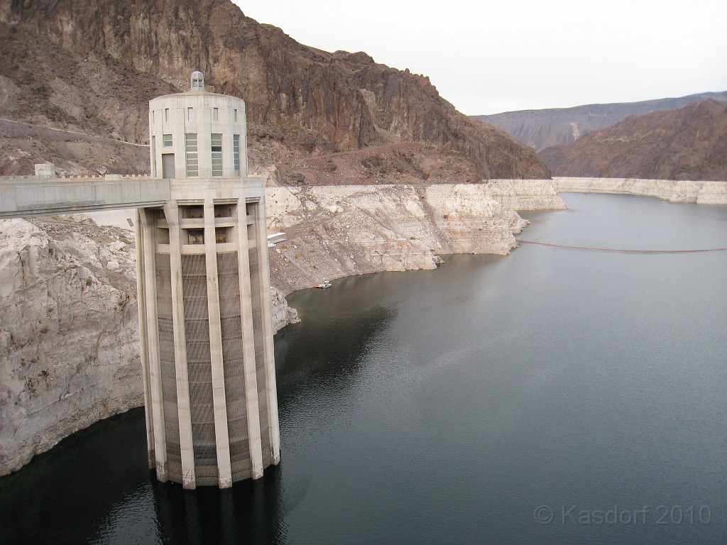 Las Vegas 2010 - Hoover Dam Revisited 0331.JPG - A prolonged dry spell, lasting over a decade, is steadily draining the water sources that power Hoover Dam’s giant turbines and has left Lake Mead at only 41 percent full. The lake has dropped 130 feet since 1999 and is now at 1,084 feet, depths not seen since 1956. The Bureau of Reclamation projects it will shrink another two feet by next month, reaching its lowest elevation since the reservoir was filled in the 1930s.